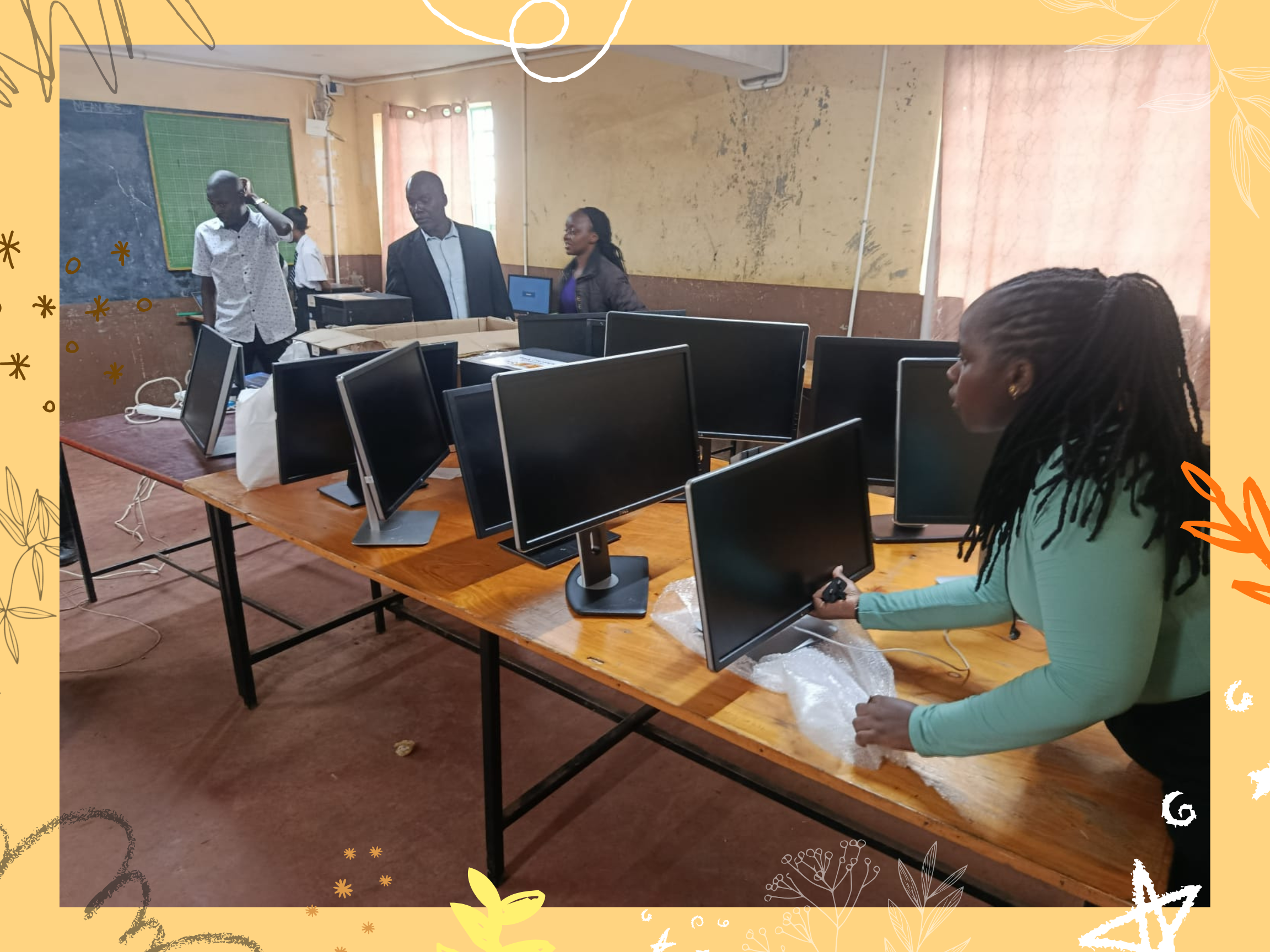 Project Manager Leah setting up the donated computers.